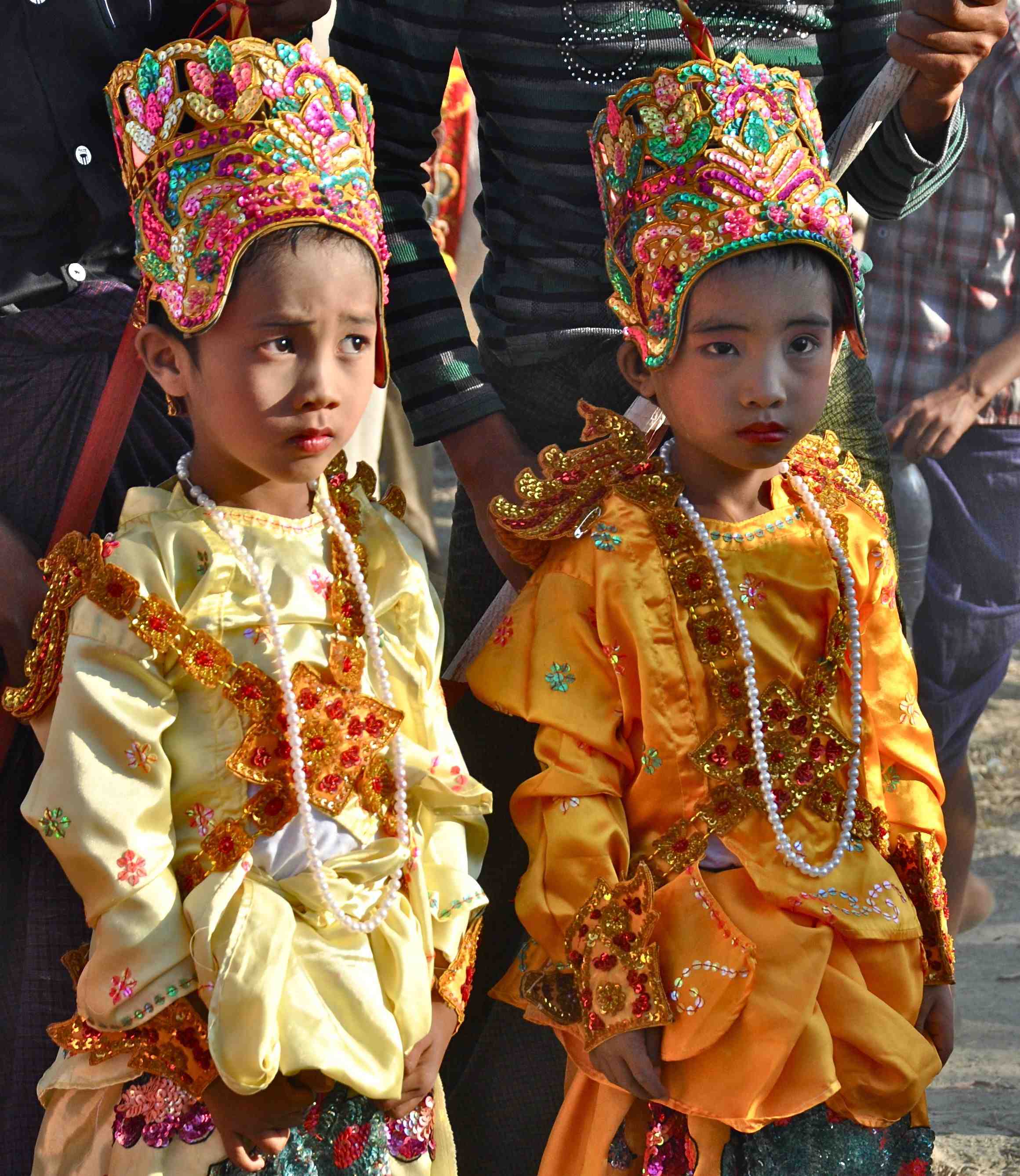 Young boys dressed like Prince Buddha prepare to become monks.